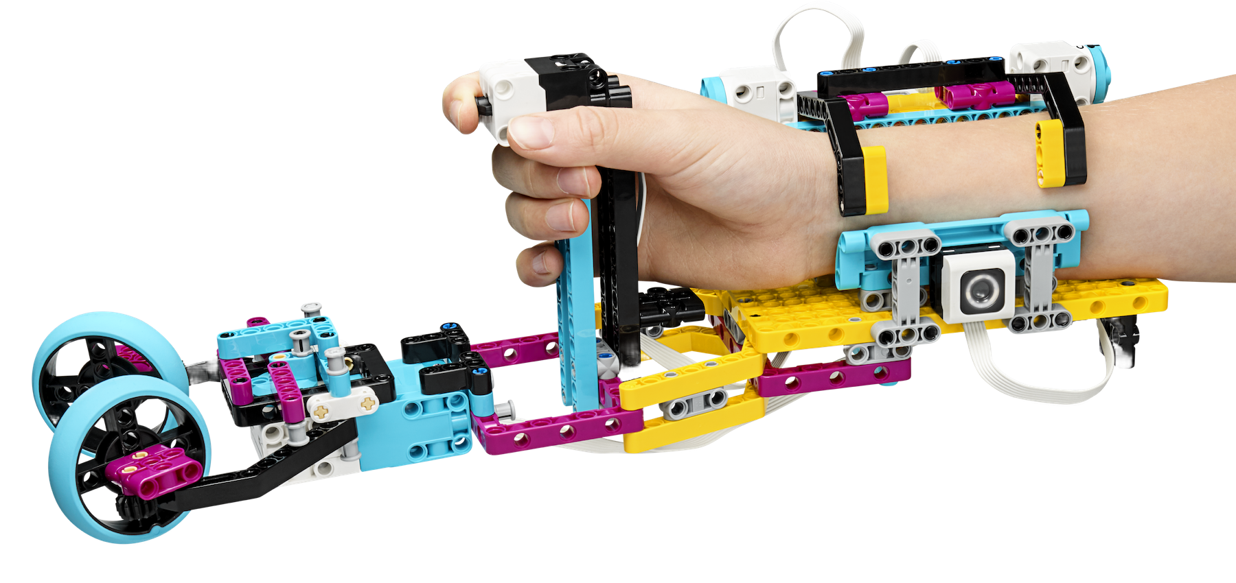 Dziecko z robotem zbudowanym z klocków LEGO podczas warsztatów robotyki FA-BRYKA w Poznaniu